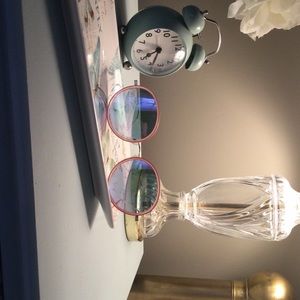 Loft sunglasses with pink frames, mirrored lenses and gold trim.